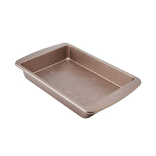 Non-stick carbon steel cake pan with embossed butterfly pattern, rose-gold finish.