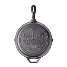 Seasoned cast iron skillet lid-side with butterfly relief and loop handle