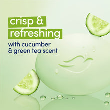 Pale green bath soap bar with cucumber slices and water droplets