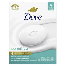 Dove sensitive beauty bar soap, white bar with dove emblem on curved soap dish
