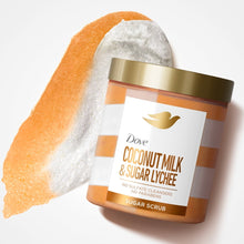 Dove coconut milk sugar lychee body scrub jar with orange exfoliating scrub scoop