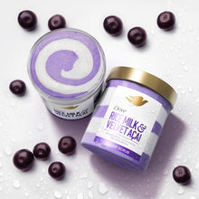 Dove sugar scrub containers with purple labels and gold lids