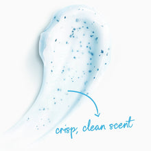 Body wash gel swatch with blue exfoliating specks and silky foam trail