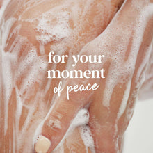 Moisturizing body wash lather on skin with soft bubbles