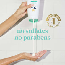 Dove body wash bottle with mint cap and hand dispensing, gentle care message visible