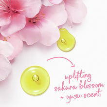 Sakura blossom and yuzu scent graphic with pink petals and yellow droplets