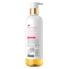 Back of oil body wash bottle with gold pump, barcode and ingredient panel