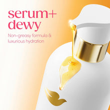 Body wash bottle with gold pump and glossy amber oil droplet, serum+dewy styling