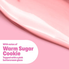 Pink body wash label card detail with text about warm sugar cookie scent notes.