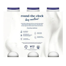 3-pack Dove Deep Moisture body wash bottles, purple caps, back label text visible.
