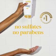 Dove glow body wash bottle dispensing gel onto hands in shower setting