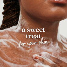 Body wash lather on skin with suds, smooth foamy texture