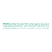Dove body scrub ingredients list panel on plain background.