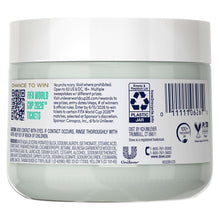 Back of Dove body scrub jar with barcode and recycling symbols