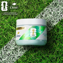 Dove body scrub jar on grass with FIFA-themed label and white lid