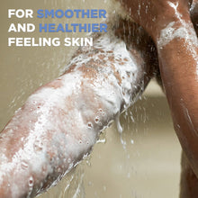 Body wash lather on skin under shower spray