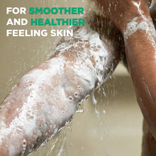 Foamy body wash lather on skin under running water
