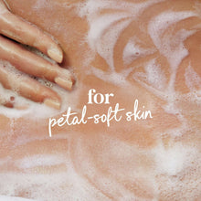 Foamy body wash on hands and fingers
