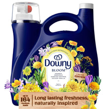 Limited edition liquid fabric softener bottle, navy blue with floral Bloom label