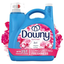 Downy April Fresh liquid fabric softener bottle, blue jug with floral pink label