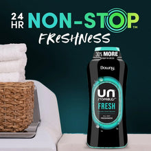 Downy Unstopables Non-Stop Fresh laundry scent booster beads bottle with towels