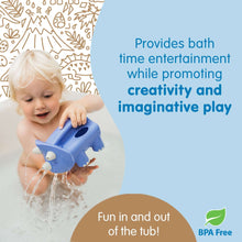 Blue elephant bath watering toy squirting water during kid bath play