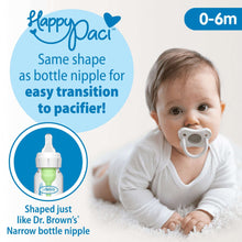 Infant holding a white pacifier