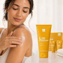 Dr. Botanicals Lemon body butter with tubes beside a woman applying skincare
