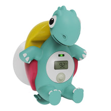 Dinosaur bath thermometer showing 92°F on the digital display with green indicator