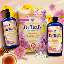 Dr Teal's Honey Blossom body care set with two bottles and a pouch