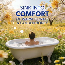 Soaking bathtub with warm florals and golden honey theme for body wash