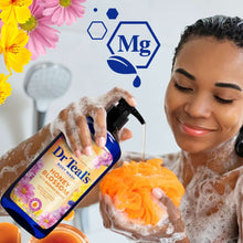 Dr Teal's Honey Blossom body wash bottle with foamy hands and orange sponge
