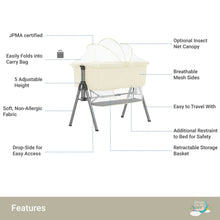 Ivory bassinet features graphic with canopy net, breathable mesh sides, adjustable height