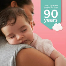 Sleeping baby in light gray shirt with 90 years badge