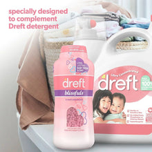 Dreft blissfuls in-wash scent booster beads bottle beside detergents and baby essentials