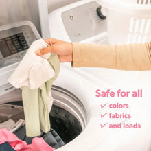 Laundry wash with folded baby clothes, Dreft blissfuls safe for colors message