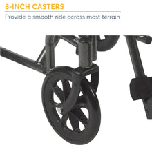 Wheelchair caster wheel with black tire and swivel fork, close-up detail