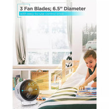 Desktop heater and fan with circular black grille and top control knob.