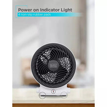 Desktop heater and fan with power indicator light and black grille, front.