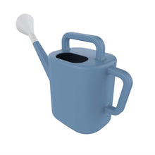 Blue resin watering can with open fill hole and removable shower nozzle