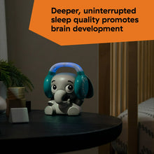Elephant Bluetooth sound machine on a table with glowing teal night light
