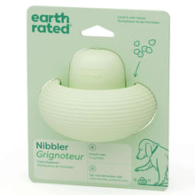 Earth Rated Nibbler treat-dispensing dog toy in mint green, ribbed base with rounded top