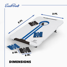 White cornhole board with blue stripe and bean bags, with size markers