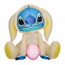 Inflatable Stitch bunny with blue face, off-white body, and pink Happy Easter egg