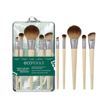 Makeup brush set with six bamboo-handled brushes in a gray storage tray, tan bristles