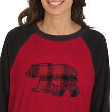 Red raglan pajama top with black sleeves and bear graphic