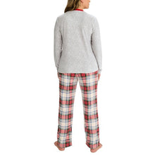 Grey pajama top with red neck trim and plaid pants, back view