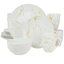 16-piece stoneware dinnerware set: white plates, bowls and mugs with gold marble accents