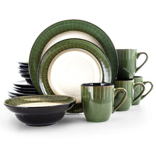 Stoneware dinnerware set with jade green grid plates, black bowls, and green mugs