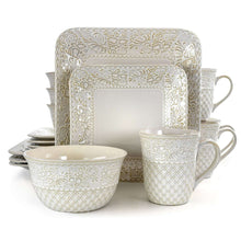 Ivory square dinnerware set with embossed lotus pattern, including plates, bowls, and mugs